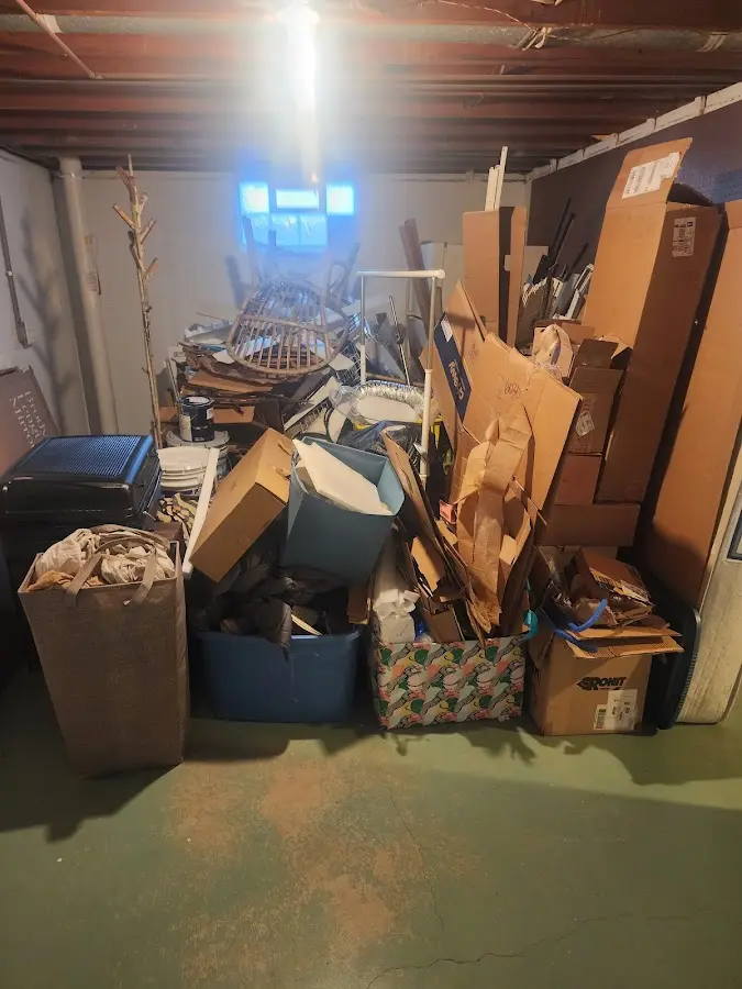 Roll-off dumpster container at job site for Yard Waste Dumpster Rental in Forestbrook